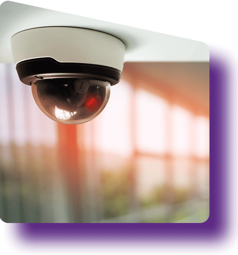 A smart IoT camera installed on an office ceiling