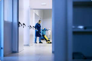 professional-cleaner-working-down-corridor-1