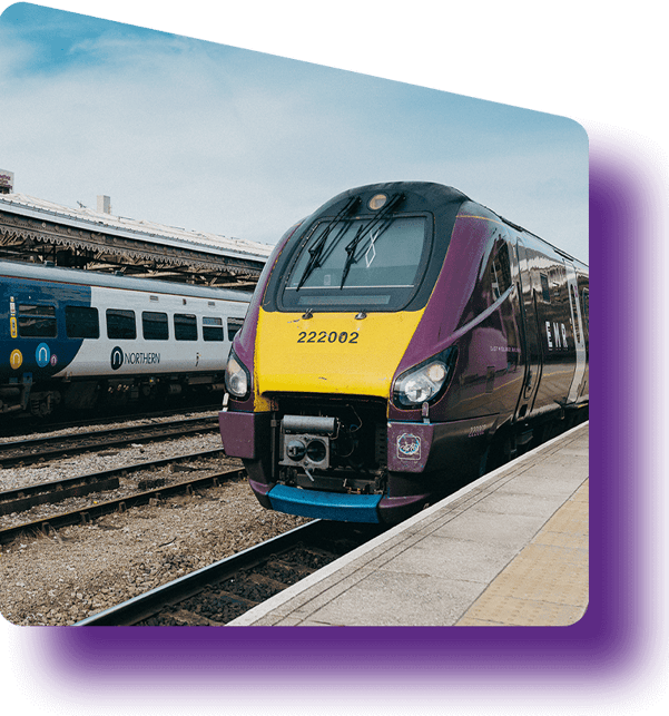 Two trains from different companies in the same station Two trains from different companies in the same station