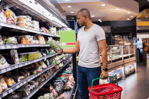 shopper-looking-at-fresh-produce-in-the-supermarket