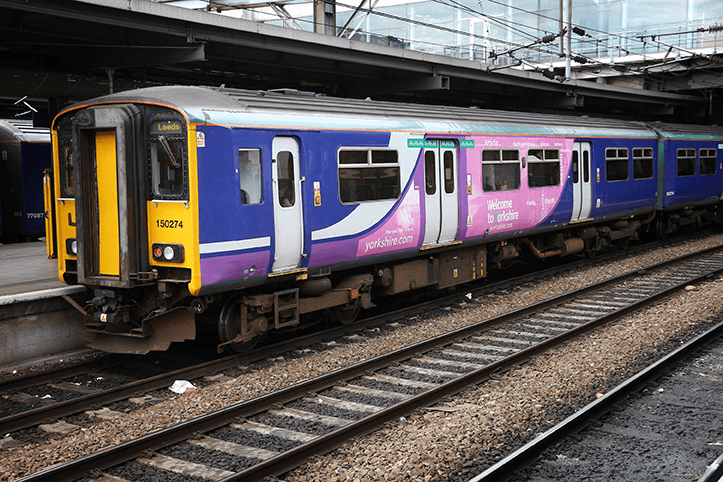 a Northern Trains Carriage at a station platform a Northern Trains Carriage at a station platform
