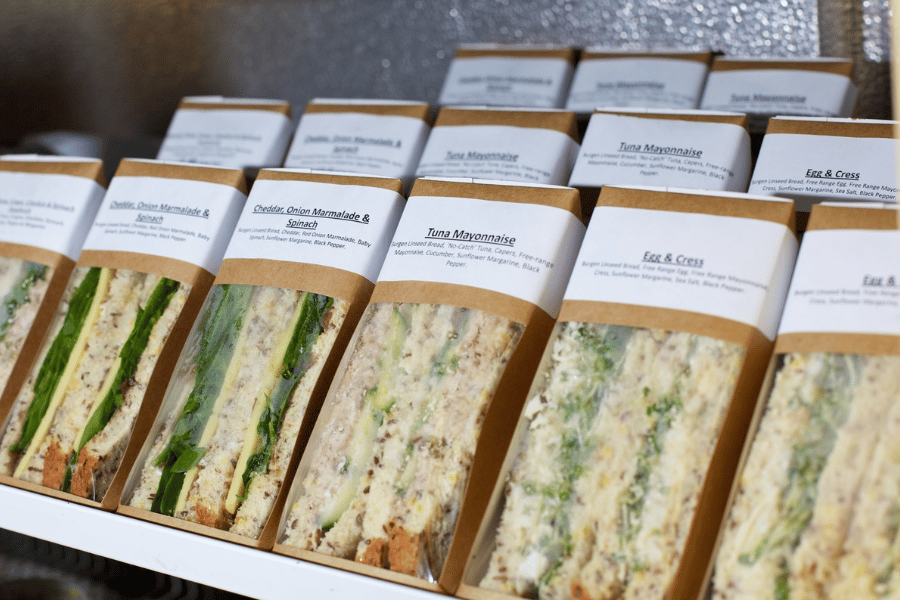 Rows of prepackaged sandwiches in a cafe